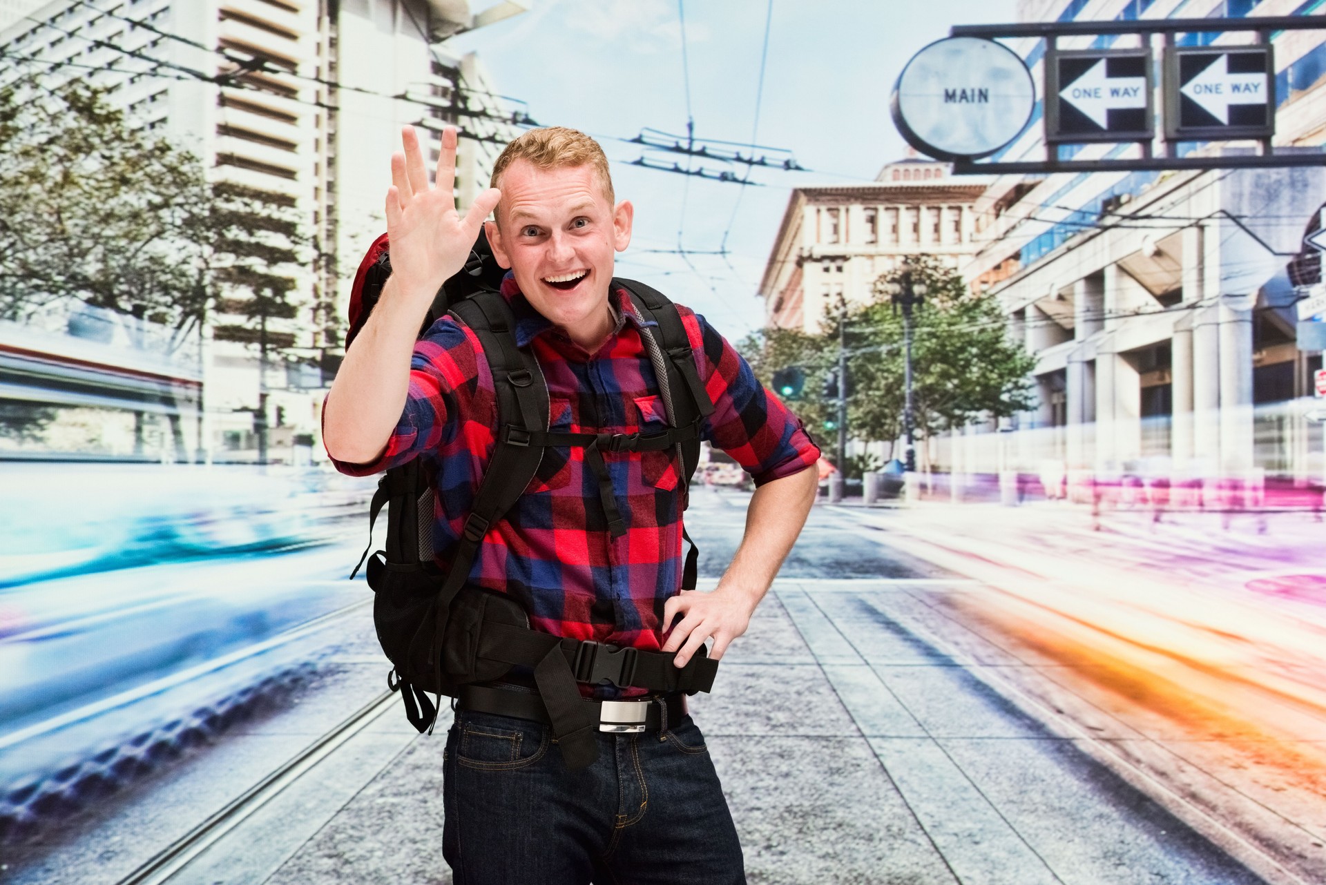 Caucasian young male who is outdoors wearing lumberjack shirt